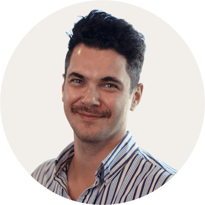 Joe_Marles_Profile image BACKGROUND COLOUR Warm Grey_ROUND_180 px x 180 px__RGB