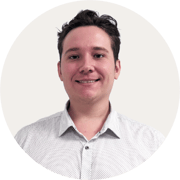 Myles_Perry_Profile image BACKGROUND COLOUR Warm Grey_ROUND_180 px x 180 px__RGB_2