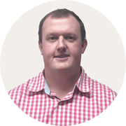 Nathan_Short_Profile image BACKGROUND COLOUR Warm Grey_ROUND_180 px x 180 px__RGB